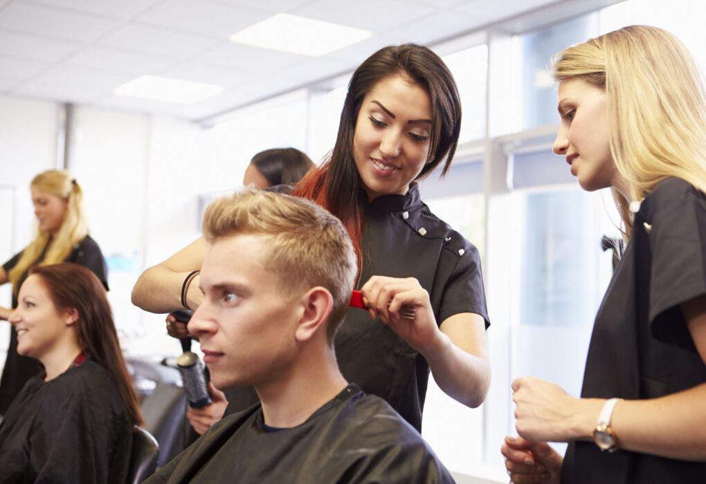 students unbraiding teachers hair fired