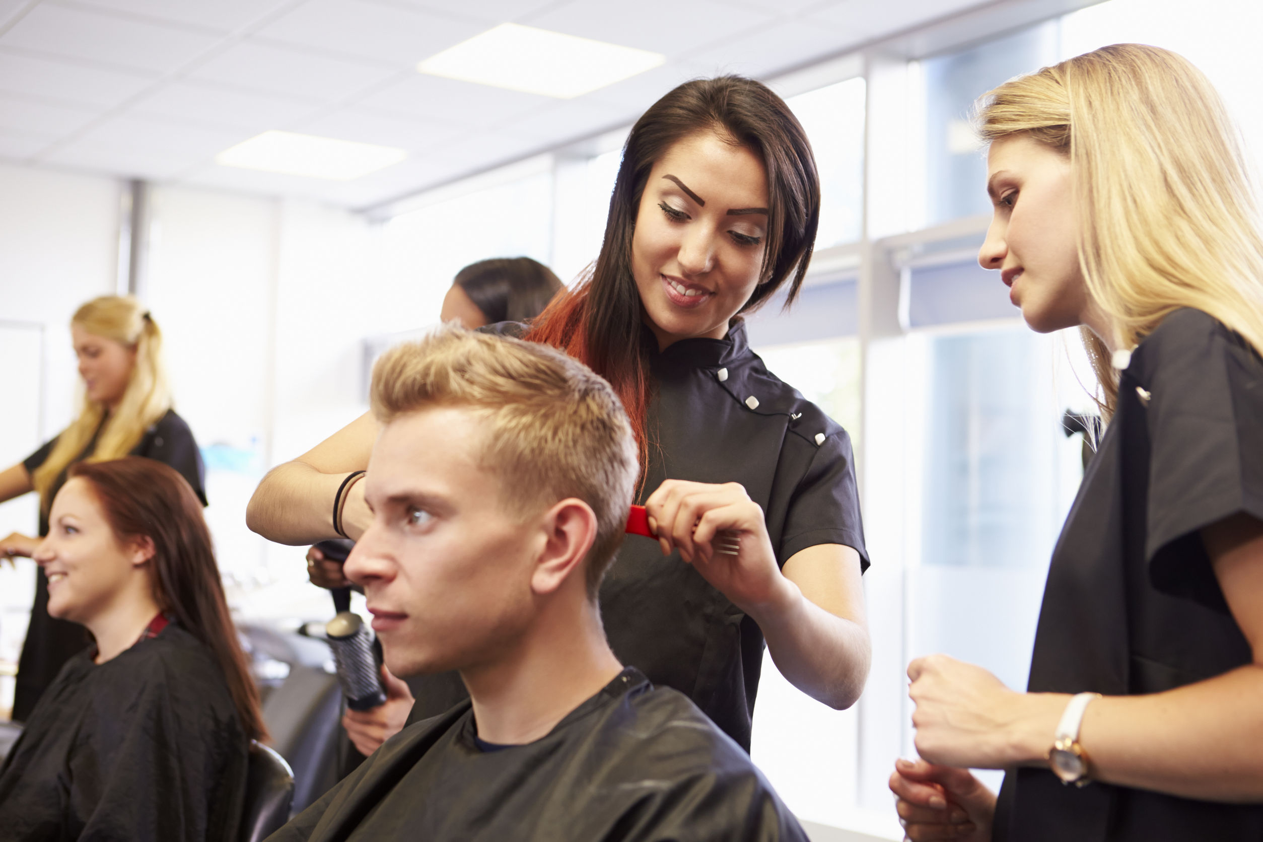 students unbraiding teachers hair fired